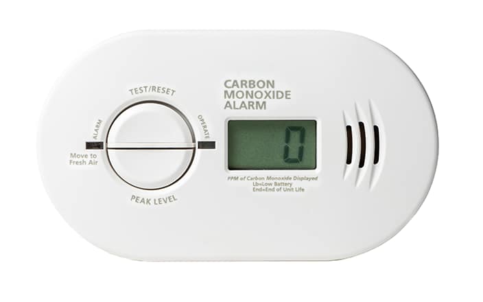 A carbon monoxide alarm on a plain white background